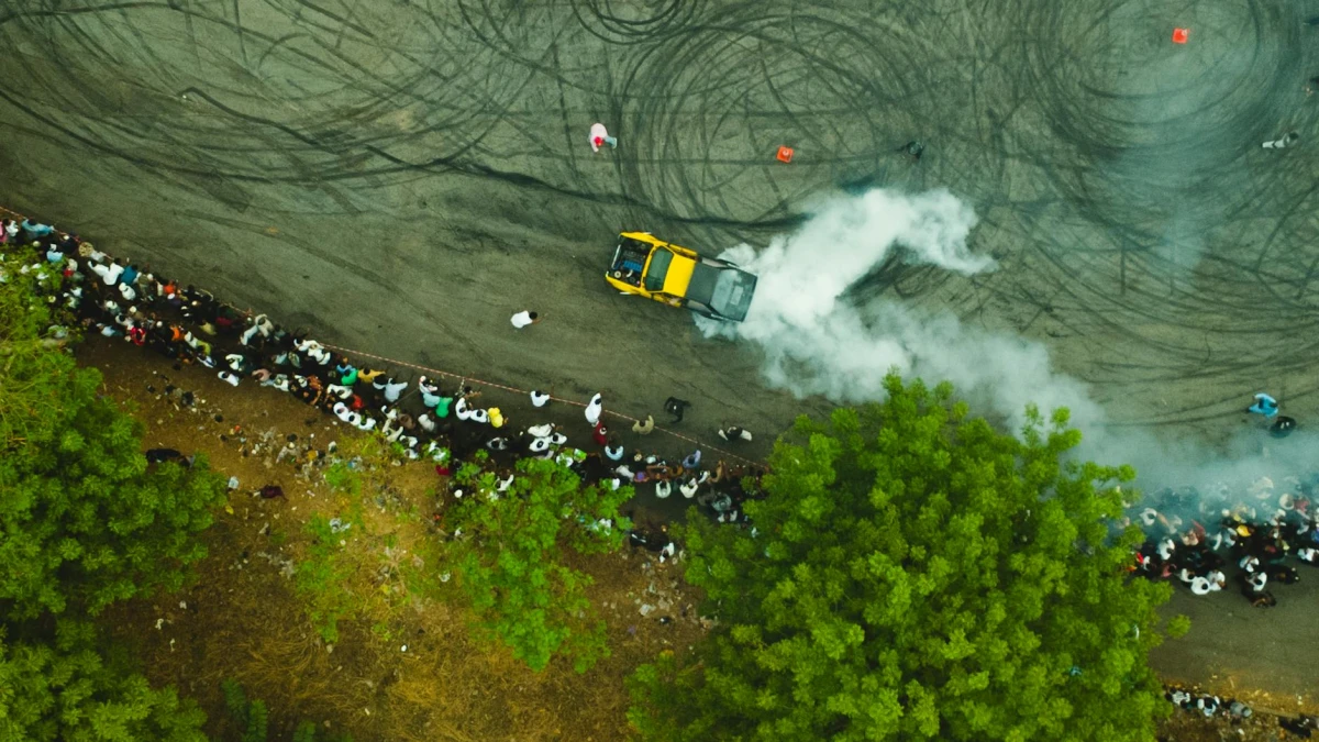 Drift event with crowd and tyre smoke